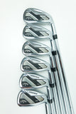 Six Callaway M-Vector iron golf clubs arranged in a fan shape on a clean white background.